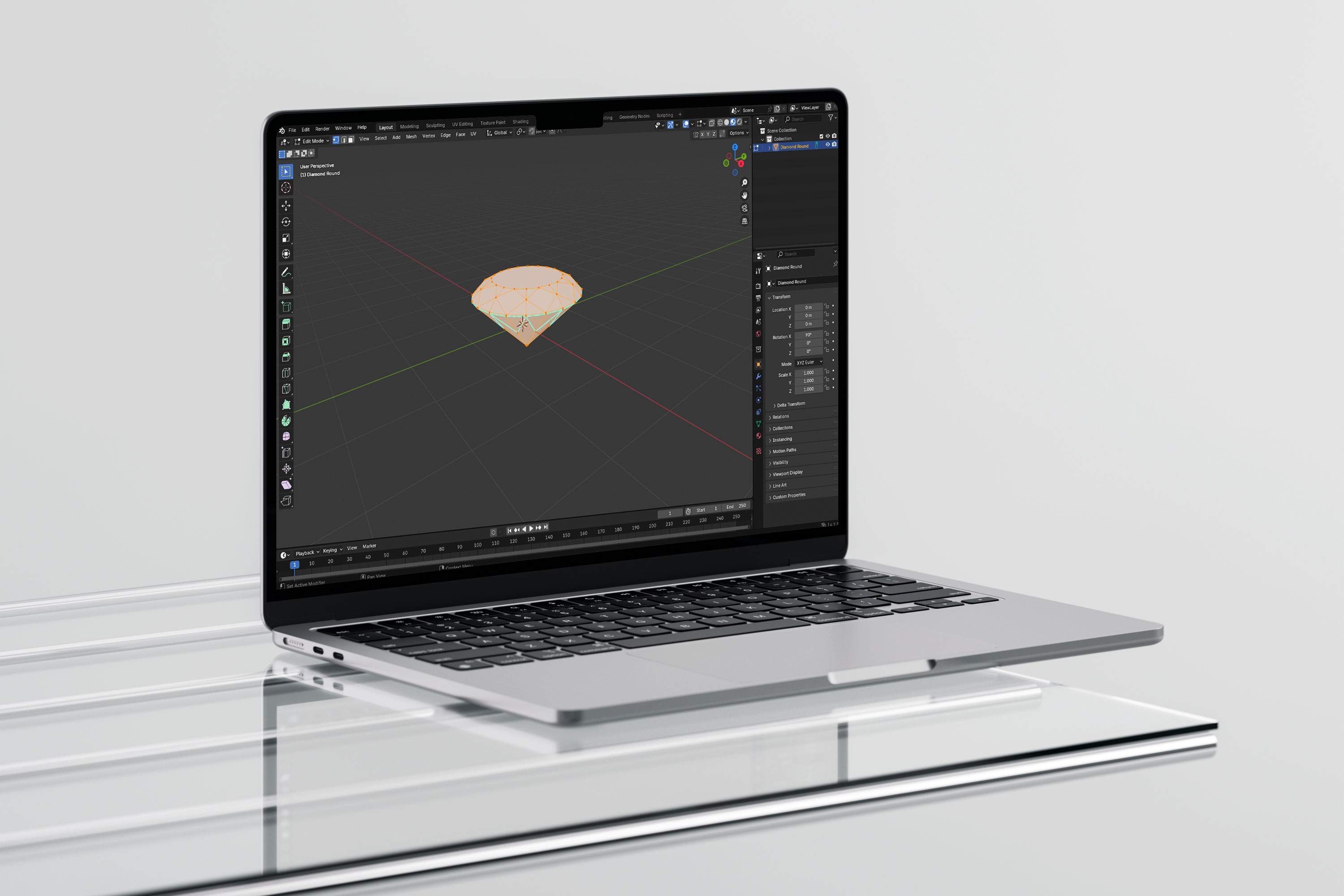 A laptop displaying a diamond model from Crypto Gems Alliance, placed on a table.