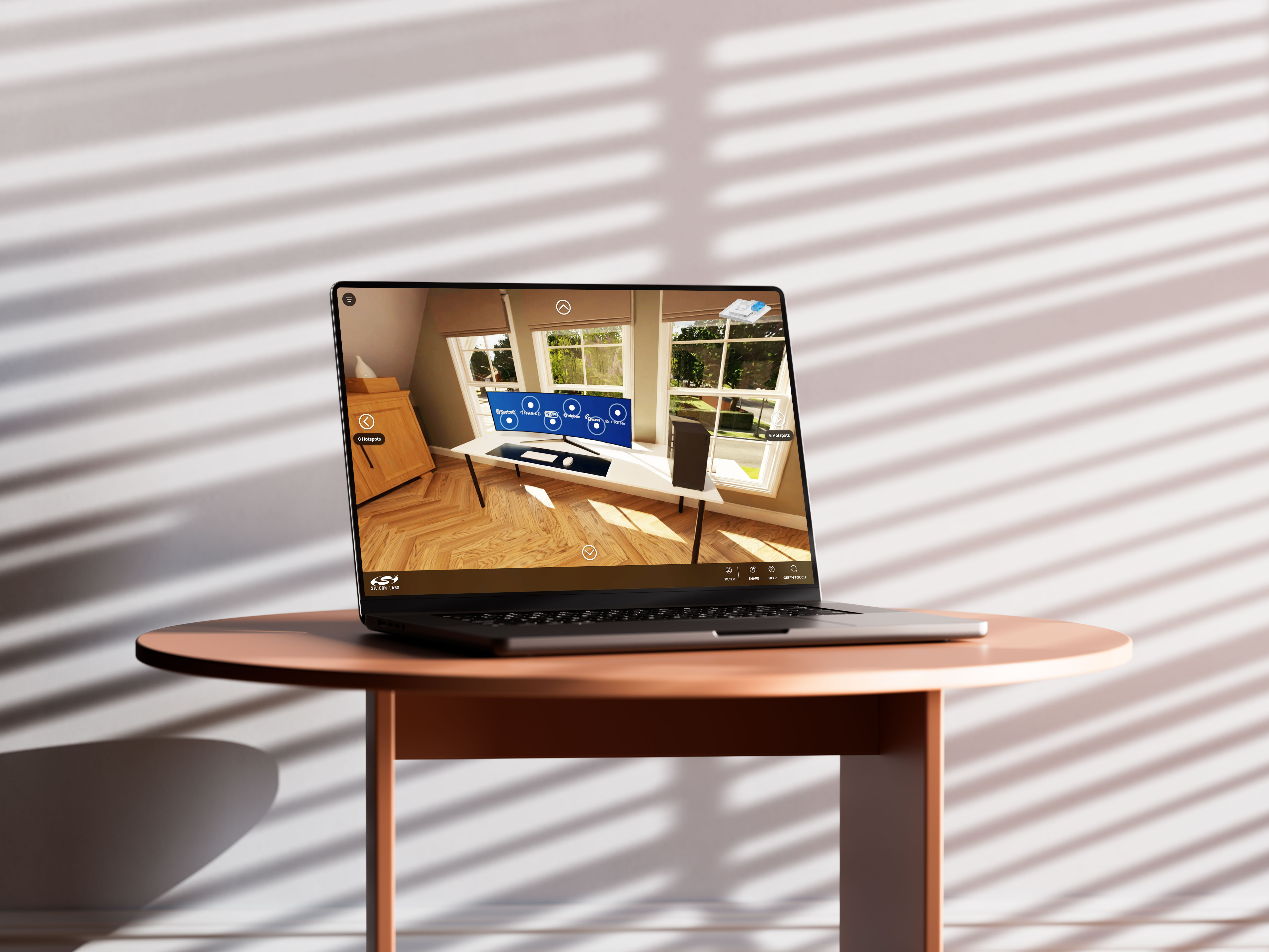 Silicon labs homes website showcase on a laptop placed on a table in a cozy homelike environment.